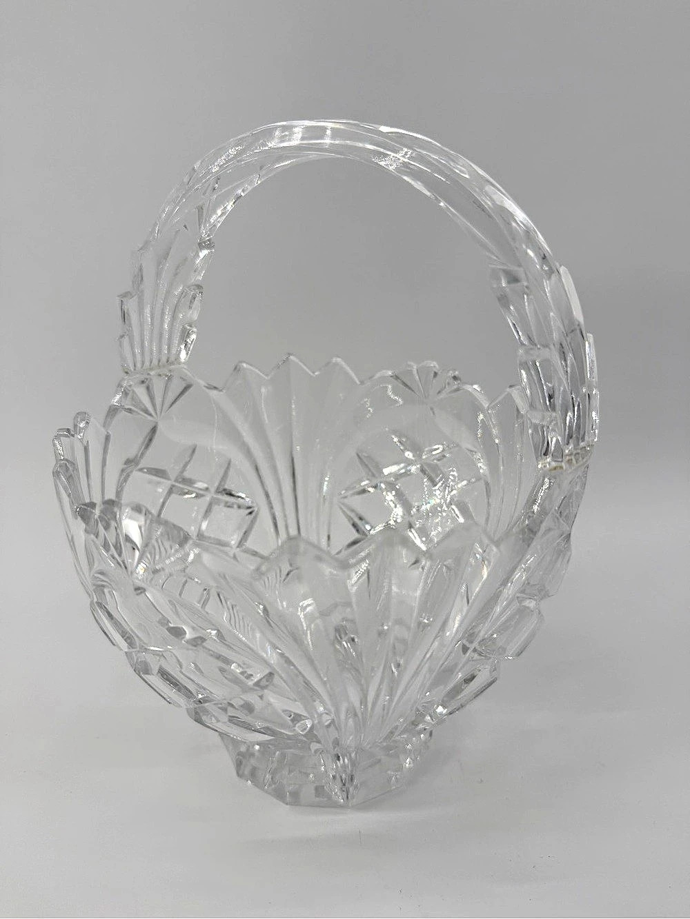 Decorative footed baskets are often used as centerpieces, candy dishes, or flora